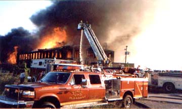 Engine 38 - 4 in the foreground with Rescue in the background.