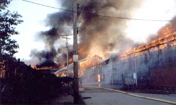 A side shot of the burning Warehouse.