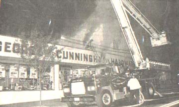 The Snorkel on scene in front of the Hardware Store fire.